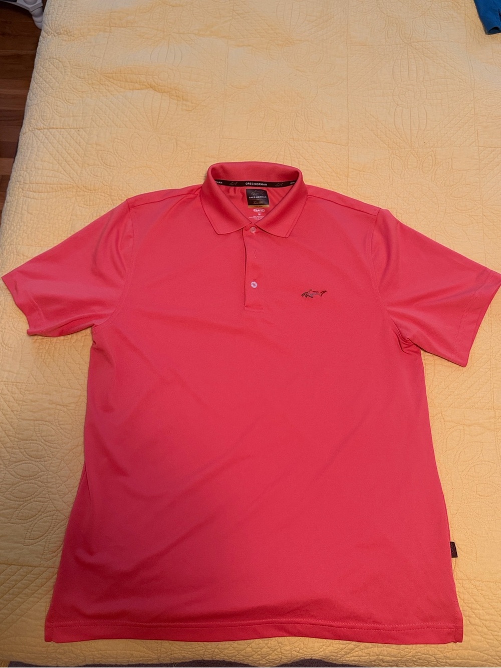 Greg Norman coral polo shirt
